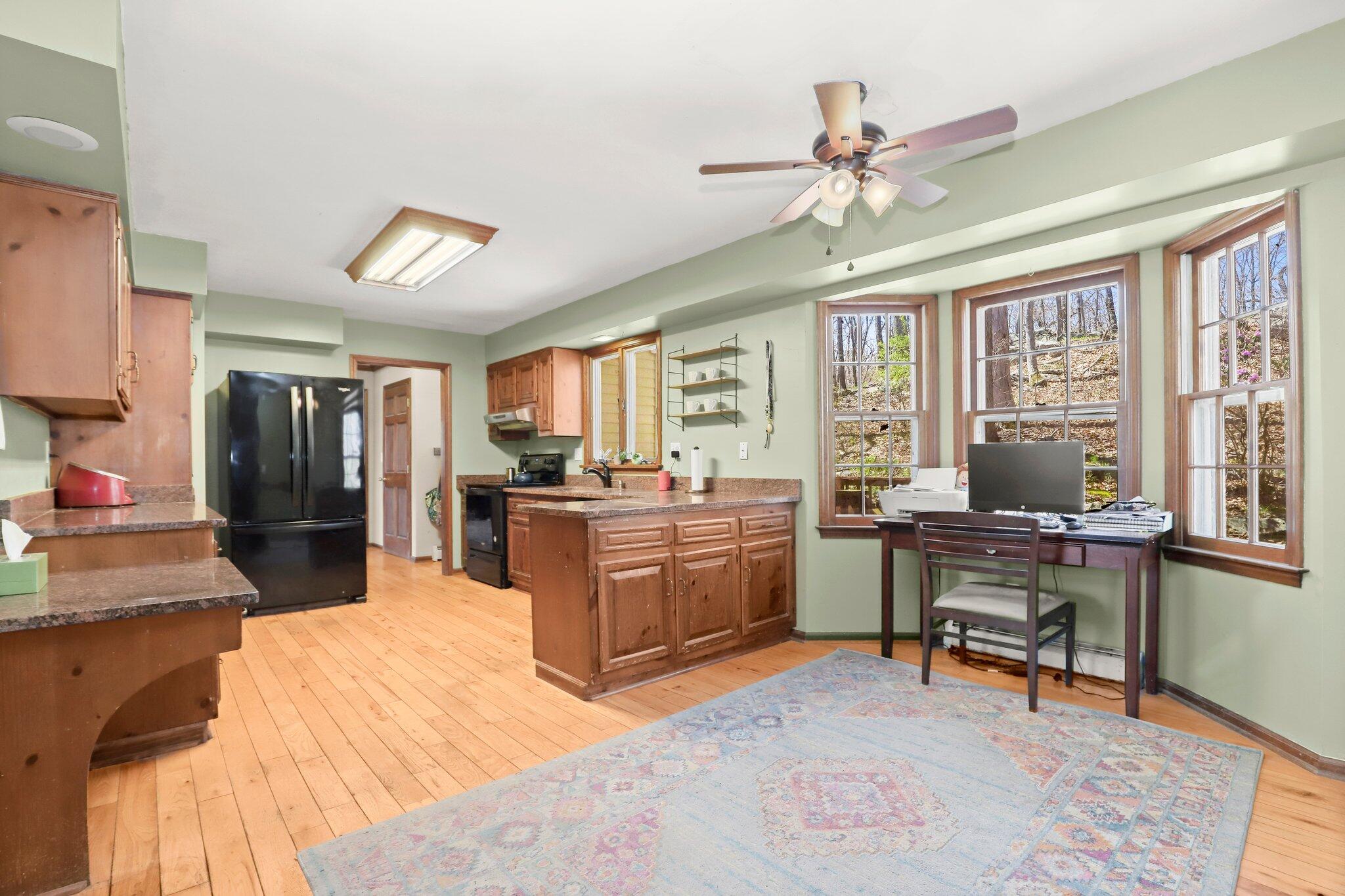 7 Allen Way Bethel, CT 06801 - Photo 9 of 31 a room with lots of furniture and a chandelier