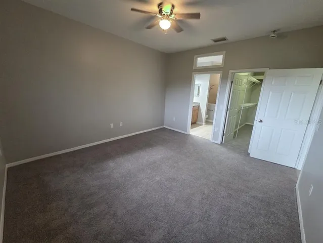 a bathroom with a sink a mirror and a bathtub