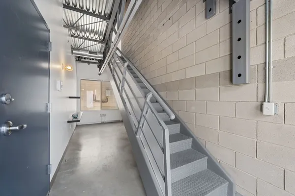 a view of staircase with white walls and white walls