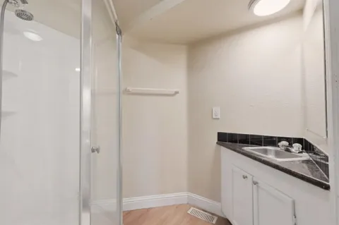 a view of a sink under an umbrella