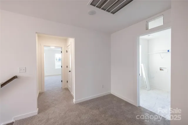 an empty room with mirror