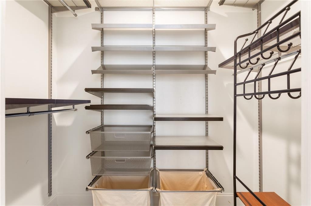 2255 Peachtree Road Northeast, Unit 326 Atlanta, GA 30309 - Photo 13 of 37 a view of walk in closet with empty racks