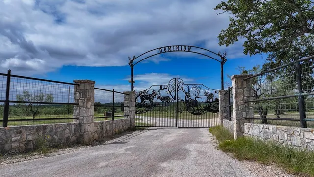 a view of a street with a small yard