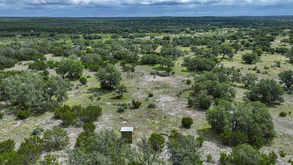 4 West Kc 210 Junction Junction, TX 76849 - Photo 9 of 14 an aerial view of a house with a yard