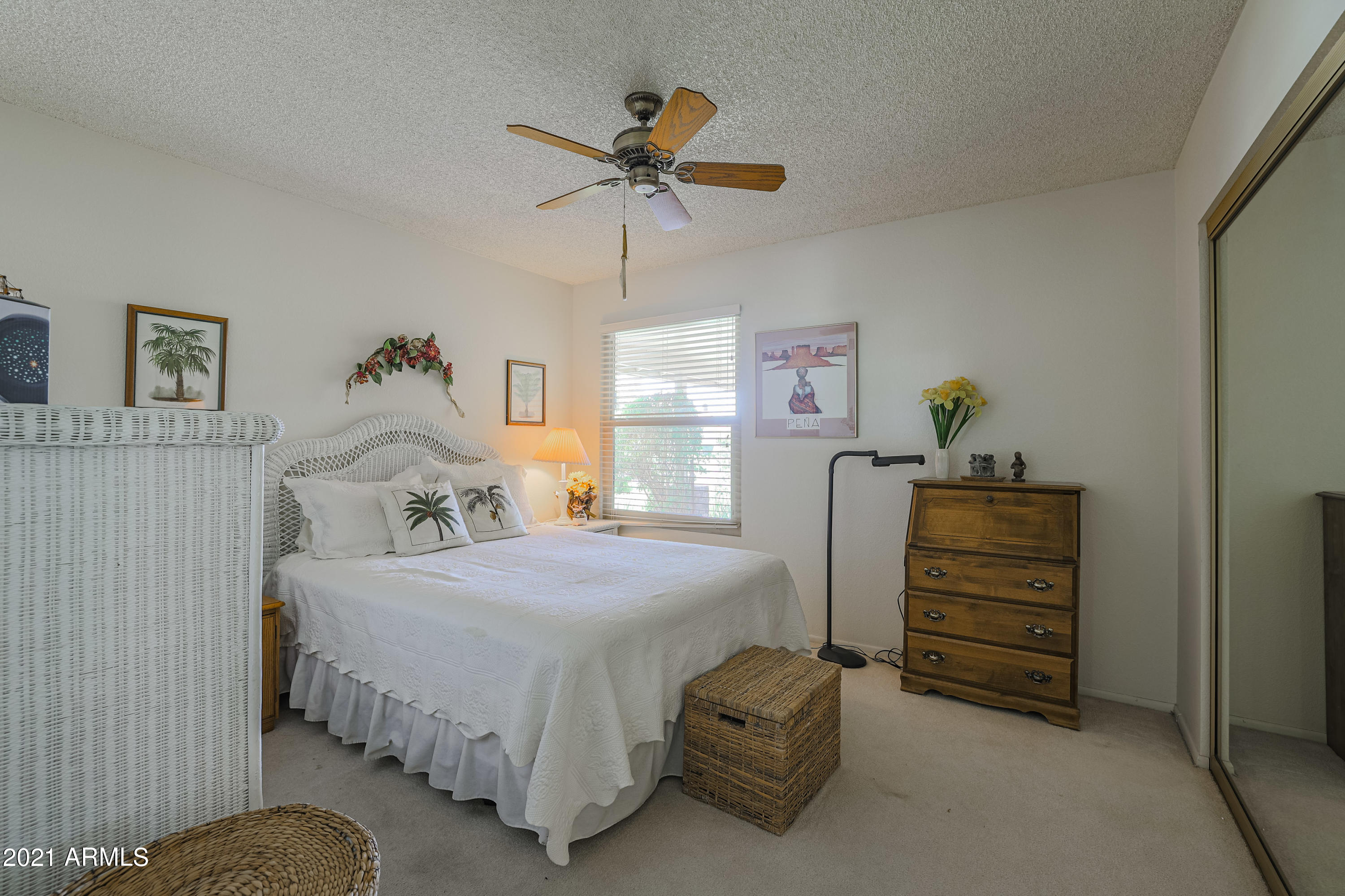630 Leisure World Mesa, AZ 85206 - Photo 21 of 59 a bedroom with a bed and furniture