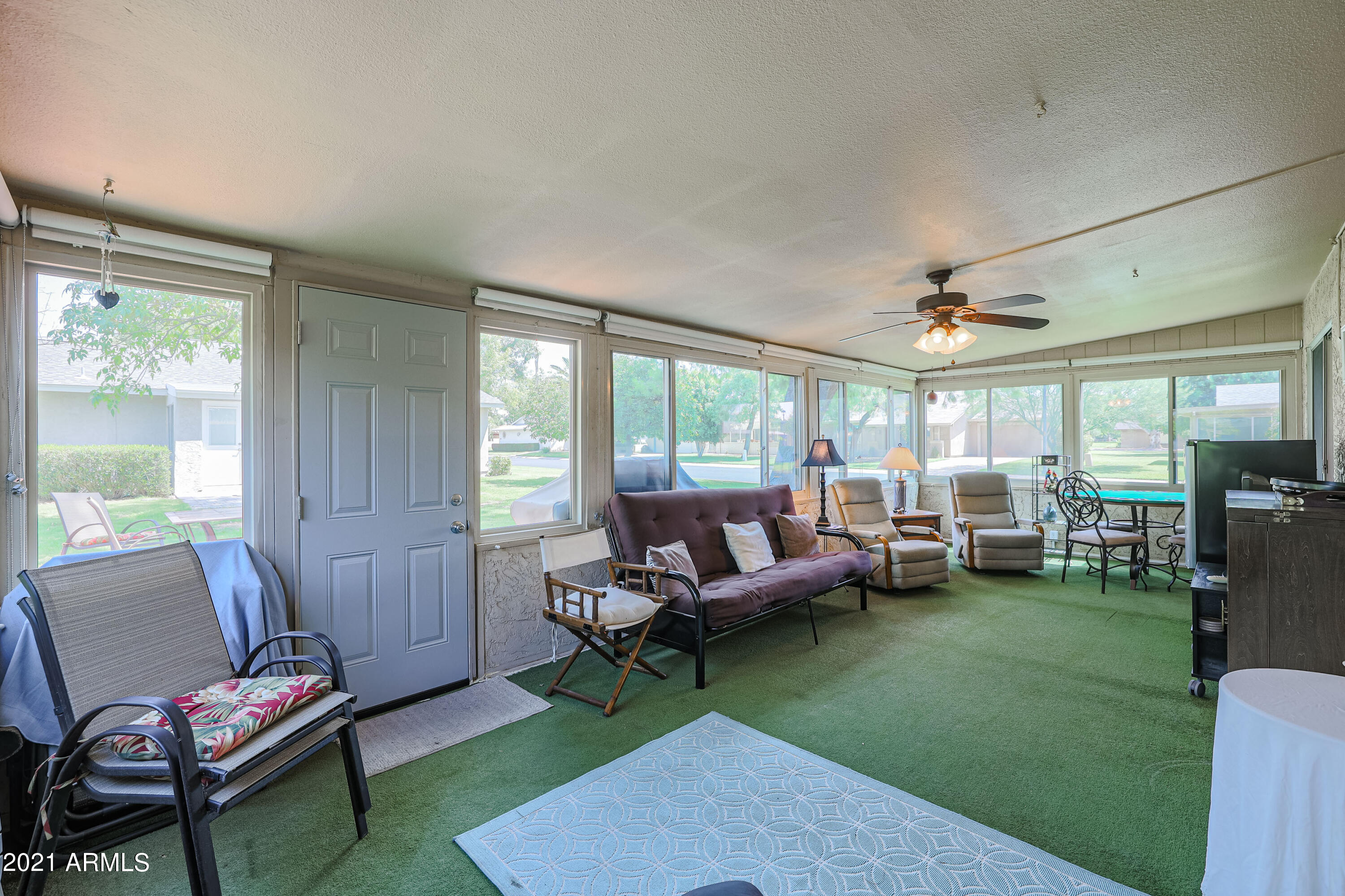 630 Leisure World Mesa, AZ 85206 - Photo 28 of 59 a living room with furniture and a large window