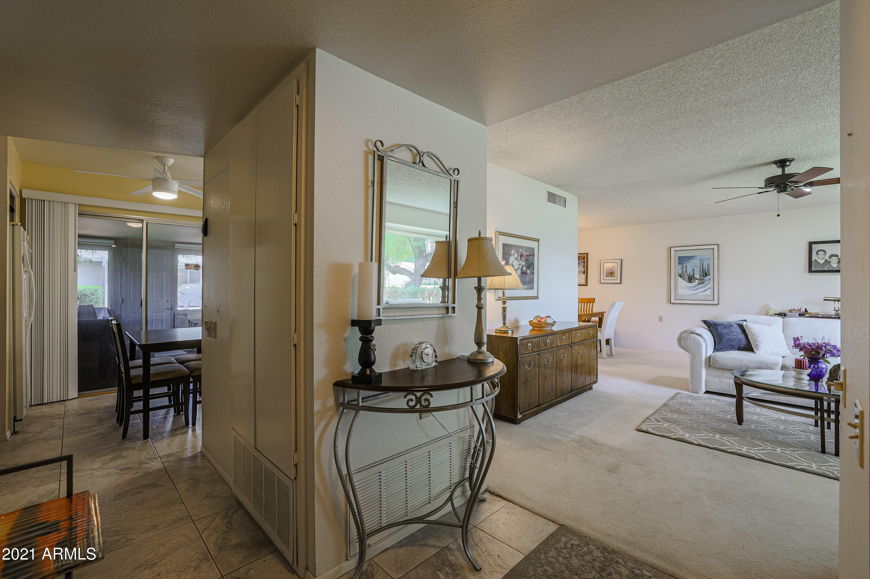 630 Leisure World Mesa, AZ 85206 - Photo 5 of 59 a living room with furniture and a window