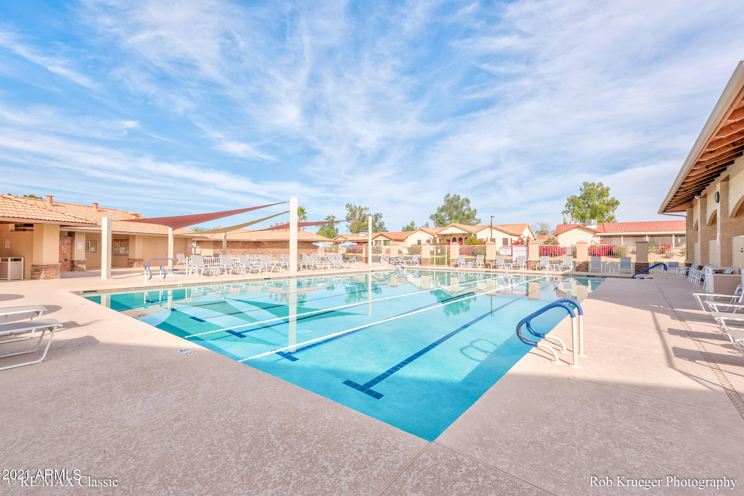 630 Leisure World Mesa, AZ 85206 - Photo 54 of 59 a view of a swimming pool and a porch