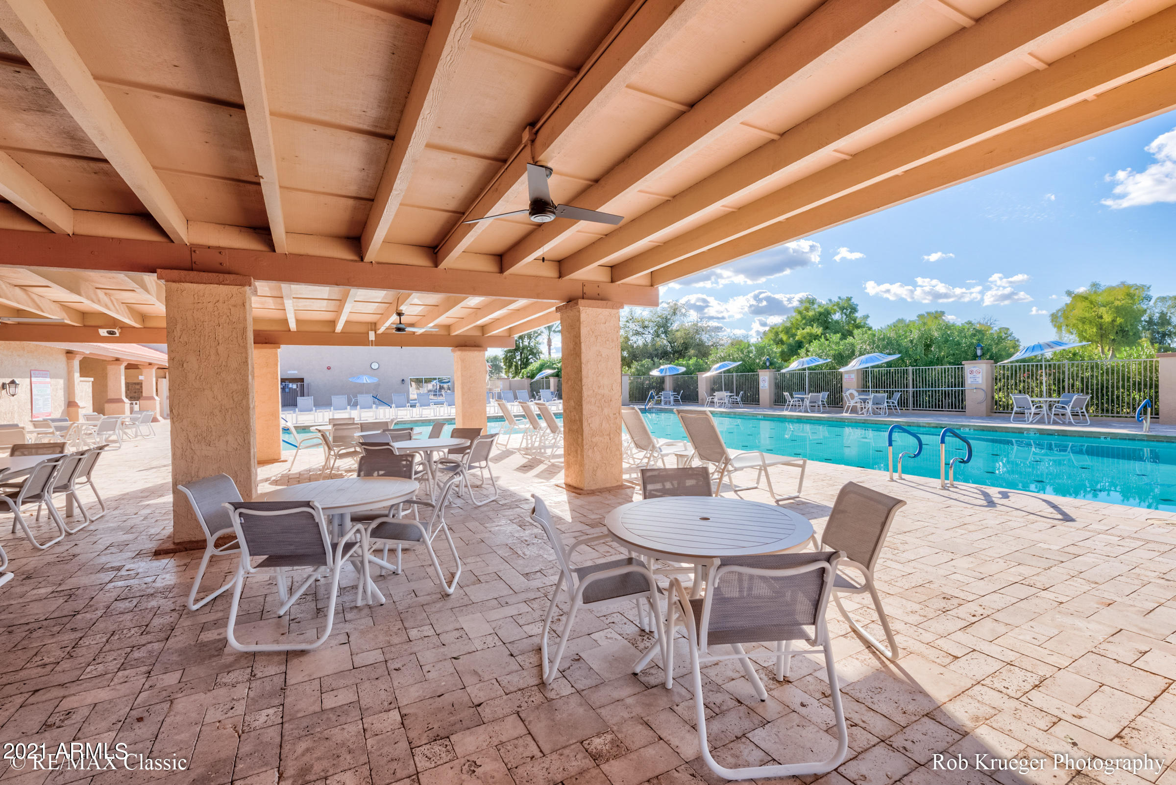 630 Leisure World Mesa, AZ 85206 - Photo 57 of 59 a view of a patio with a table and chairs