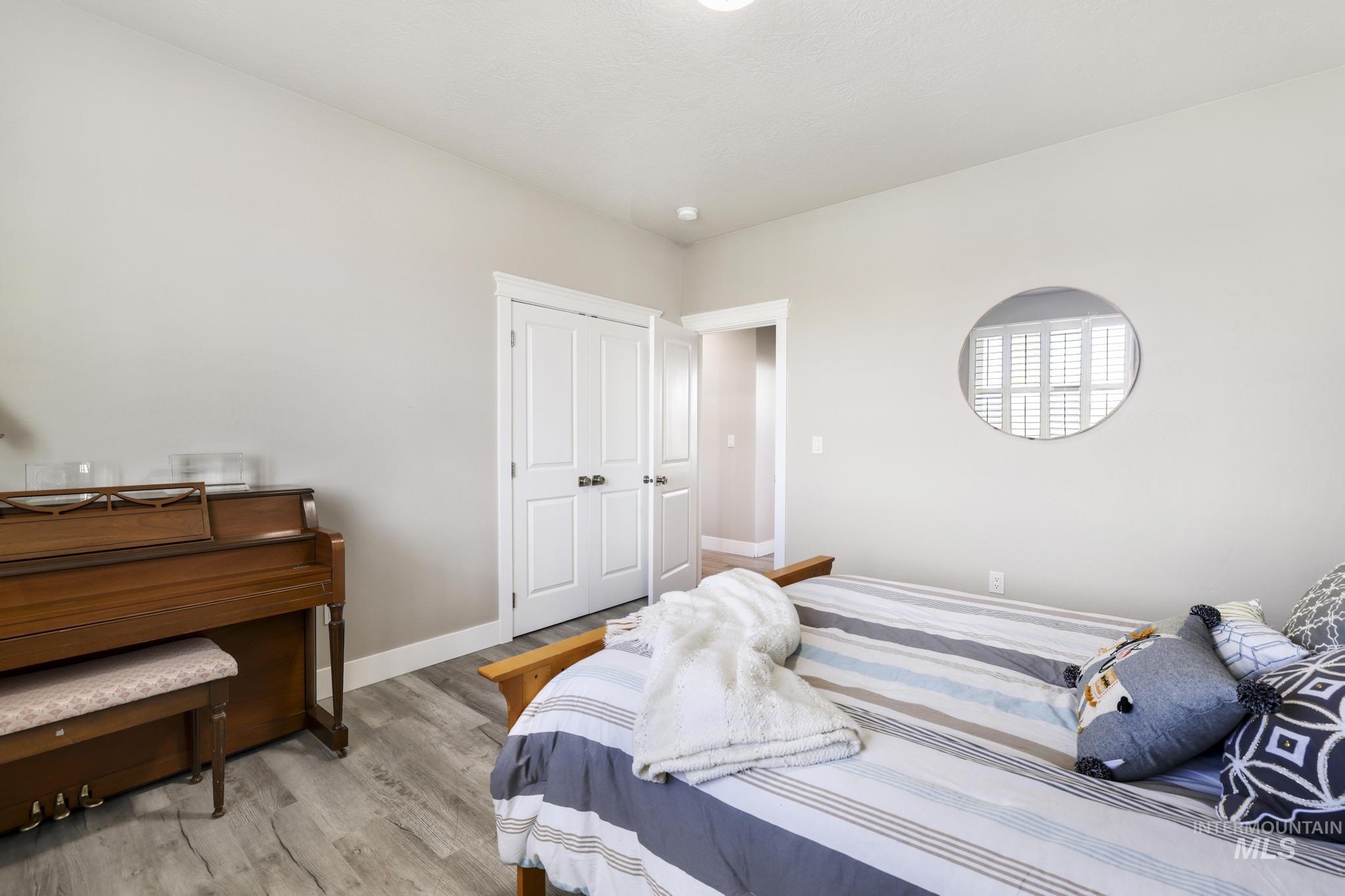 758 Cedar Crk Road Rogerson, ID 83302 - Photo 16 of 50 Light gray walls complementing wood-finish flooring