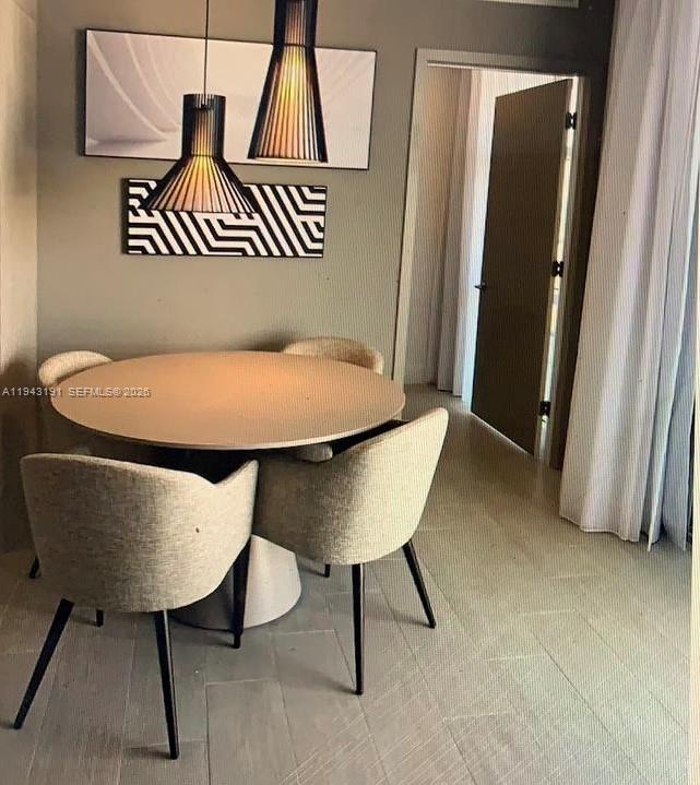 4010 South Ocean Drive, Unit R3004 Hollywood, FL 33019 - Photo 2 of 11 a balcony with table and chairs