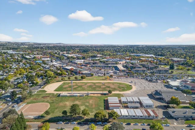 a view of a swimming pool and a chairs