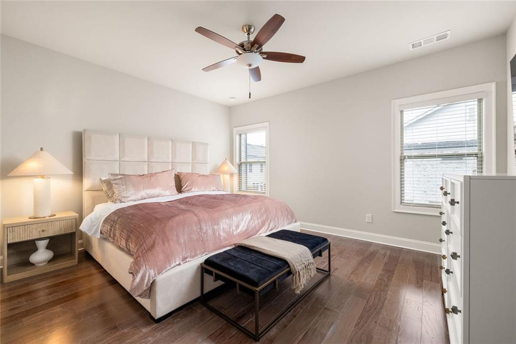 4751 Roswell Road Atlanta, GA 30342 - Photo 16 of 36 a bedroom with a bed and window