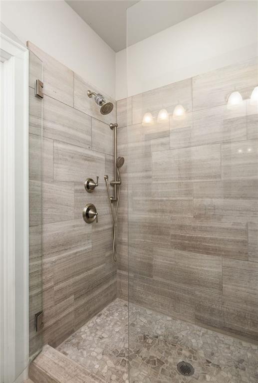 4751 Roswell Road Atlanta, GA 30342 - Photo 20 of 36 a bathroom with a shower