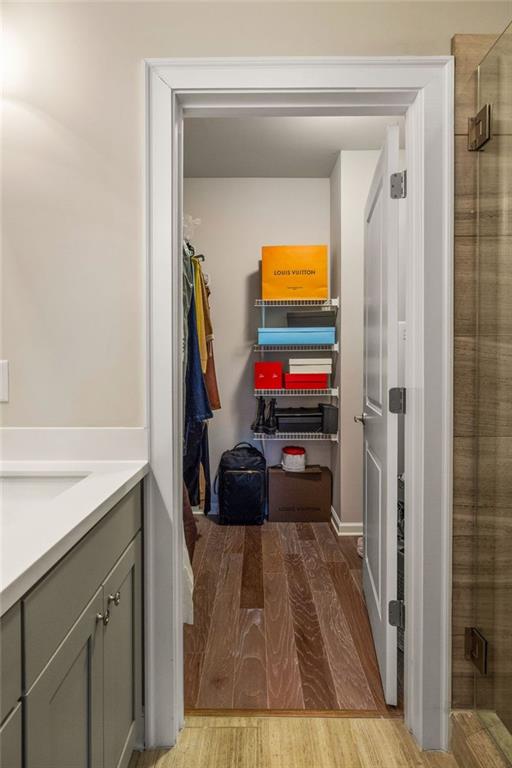 4751 Roswell Road Atlanta, GA 30342 - Photo 21 of 36 a utility room with closet and a mirror
