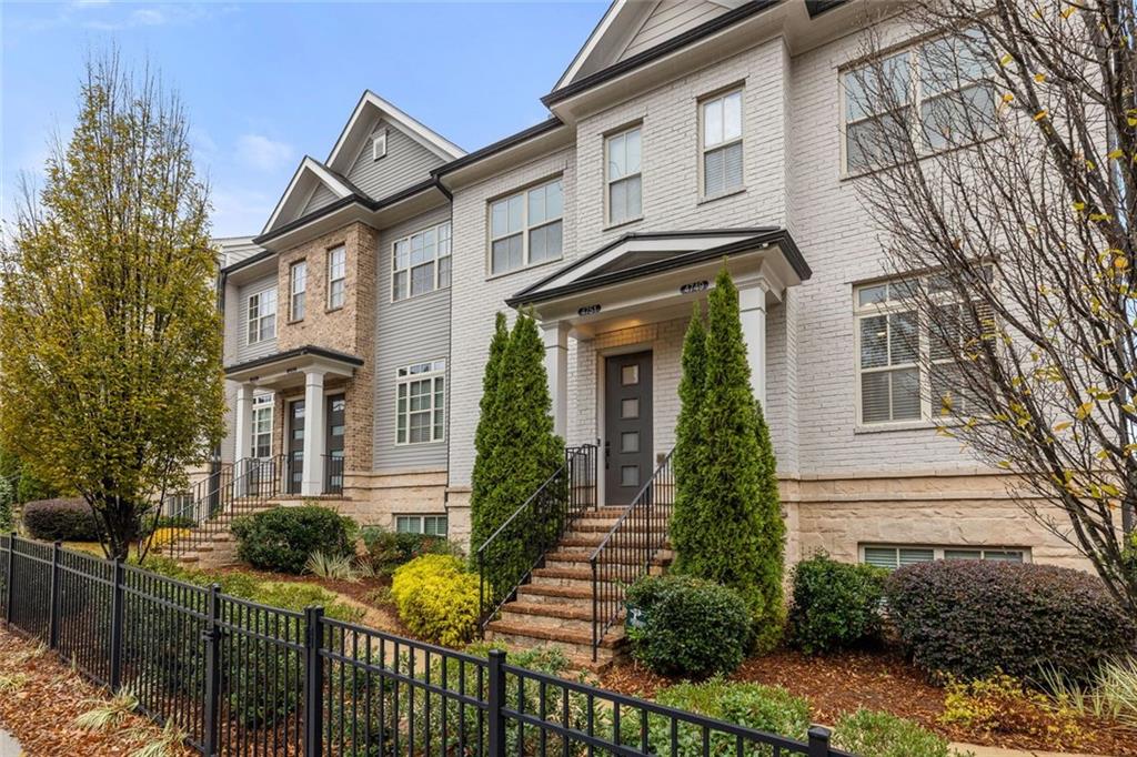4751 Roswell Road Atlanta, GA 30342 - Photo 27 of 36 a front view of a house with glass windows
