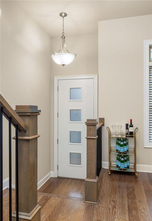 4751 Roswell Road Atlanta, GA 30342 - Photo 6 of 36 a view of an empty room with kitchen and window