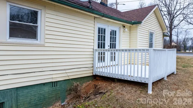 a view of a porch with a bench