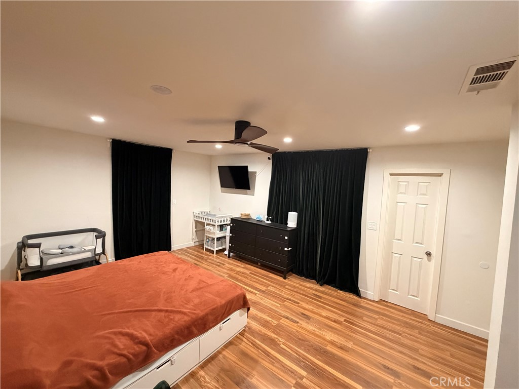 30009 Hunstock Street Castaic, CA 91384 - Photo 11 of 23 a bedroom with a bed and a dresser