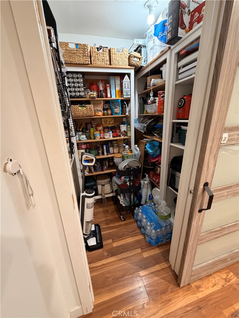 30009 Hunstock Street Castaic, CA 91384 - Photo 14 of 23 a view of walk in closet with clothes and shoes