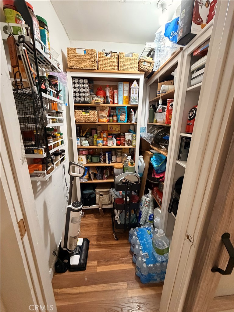 30009 Hunstock Street Castaic, CA 91384 - Photo 16 of 23 a view of a walk in closet with clothes and shoes