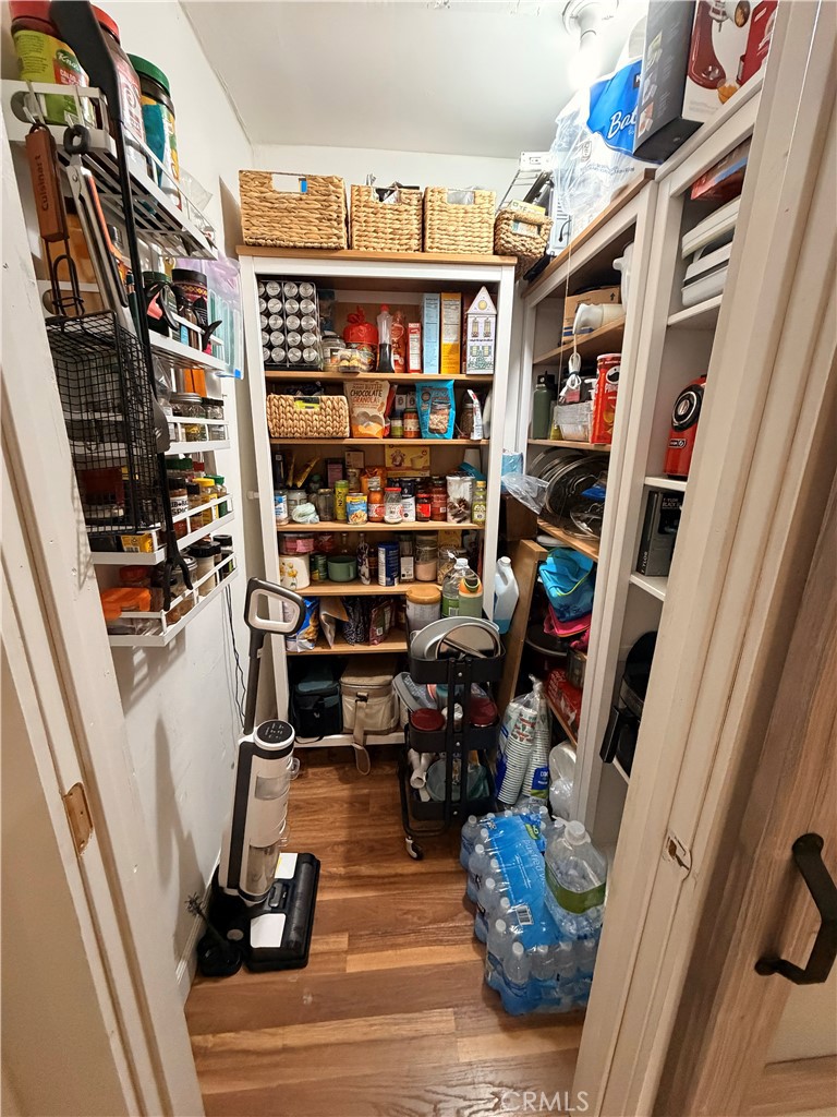 30009 Hunstock Street Castaic, CA 91384 - Photo 17 of 23 a view of a walk in closet with clothes and shoes