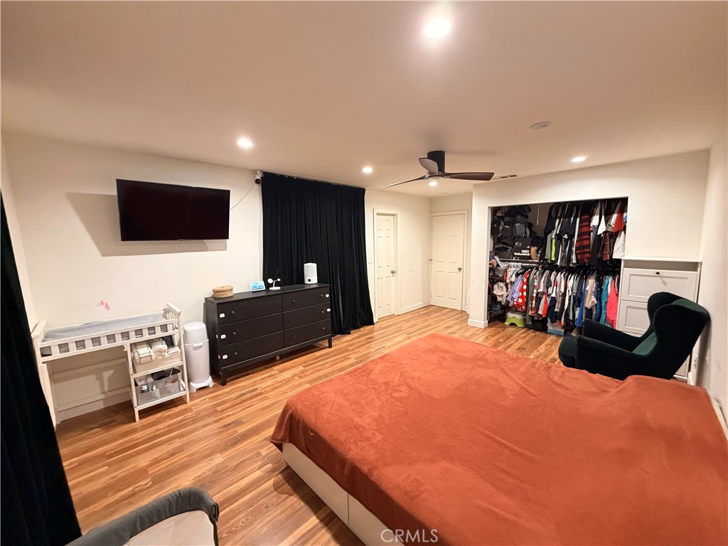 30009 Hunstock Street Castaic, CA 91384 - Photo 2 of 23 a bedroom with a bed and a flat screen tv