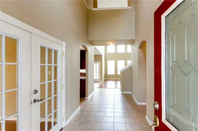 a view of a hallway with windows