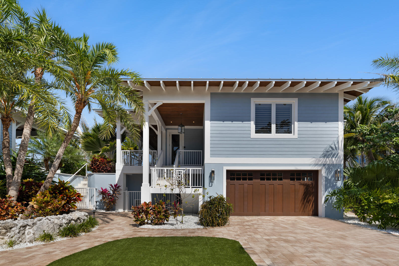 57223 Morton Street Marathon, FL 33050 - Photo 20 of 159 a front view of a house with a garden