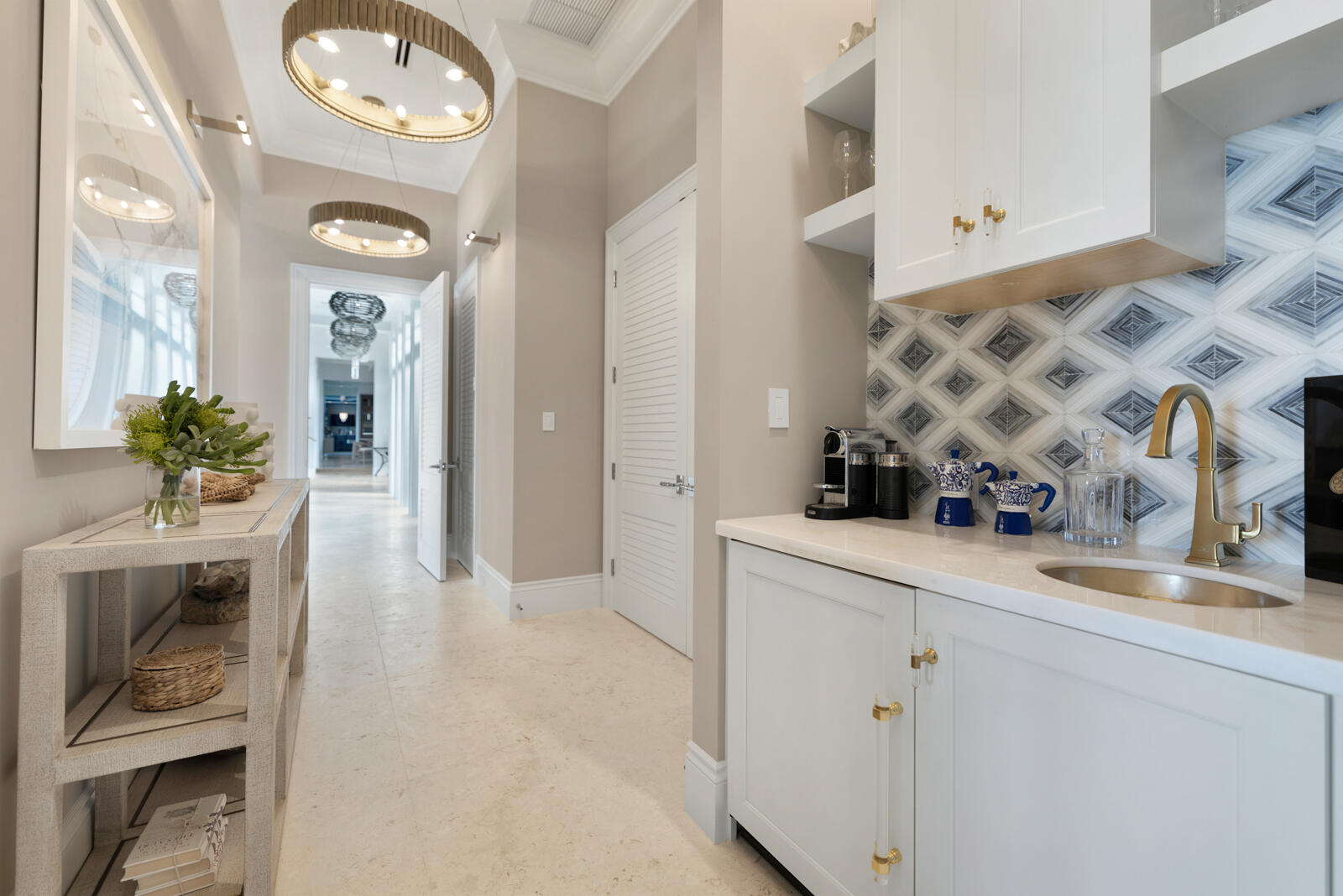 57223 Morton Street Marathon, FL 33050 - Photo 51 of 159 a view of a hallway that has two chairs and a clock on the wall
