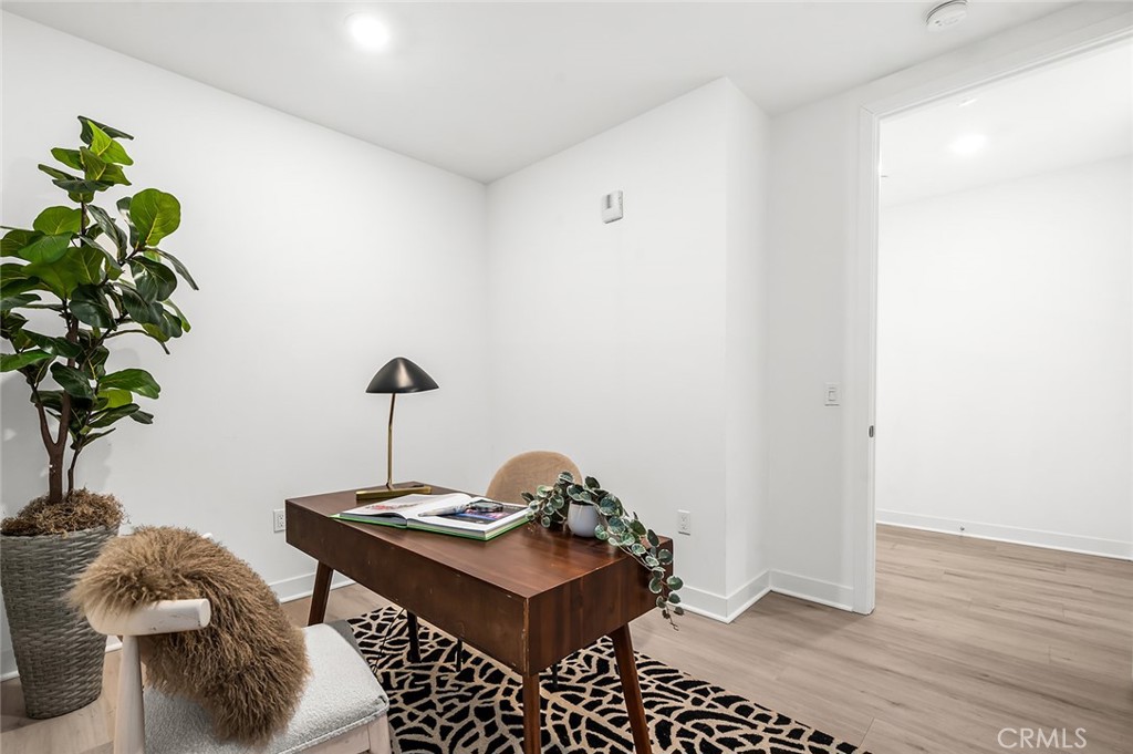 3604 Rivington Irvine, CA 92612 - Photo 15 of 54 a room with a table and a potted plant