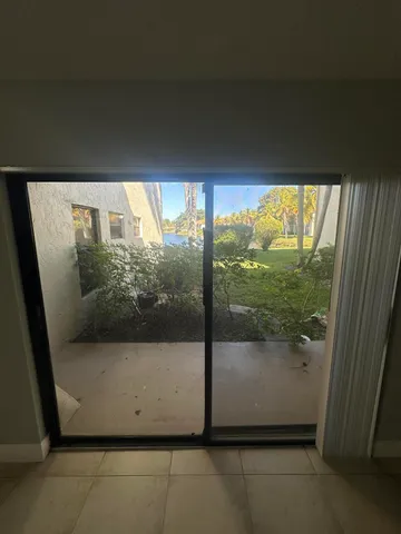 a view of a glass door and window
