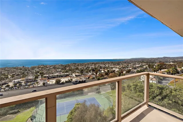 a view of a balcony with city view