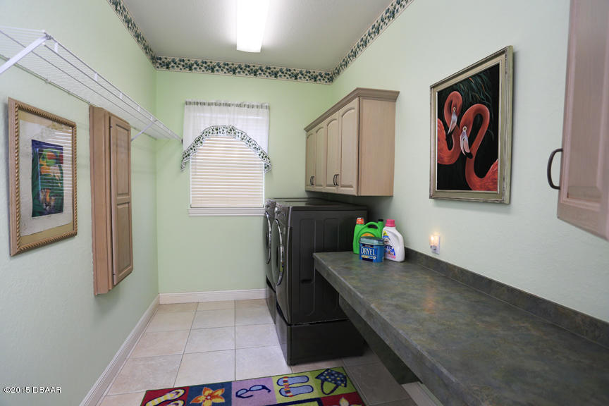 119 Inlet Harbor Road Ponce Inlet, FL 32127 - Photo 18 of 46 Laundry Room