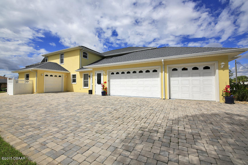 119 Inlet Harbor Road Ponce Inlet, FL 32127 - Photo 2 of 46 4 Car Garage!