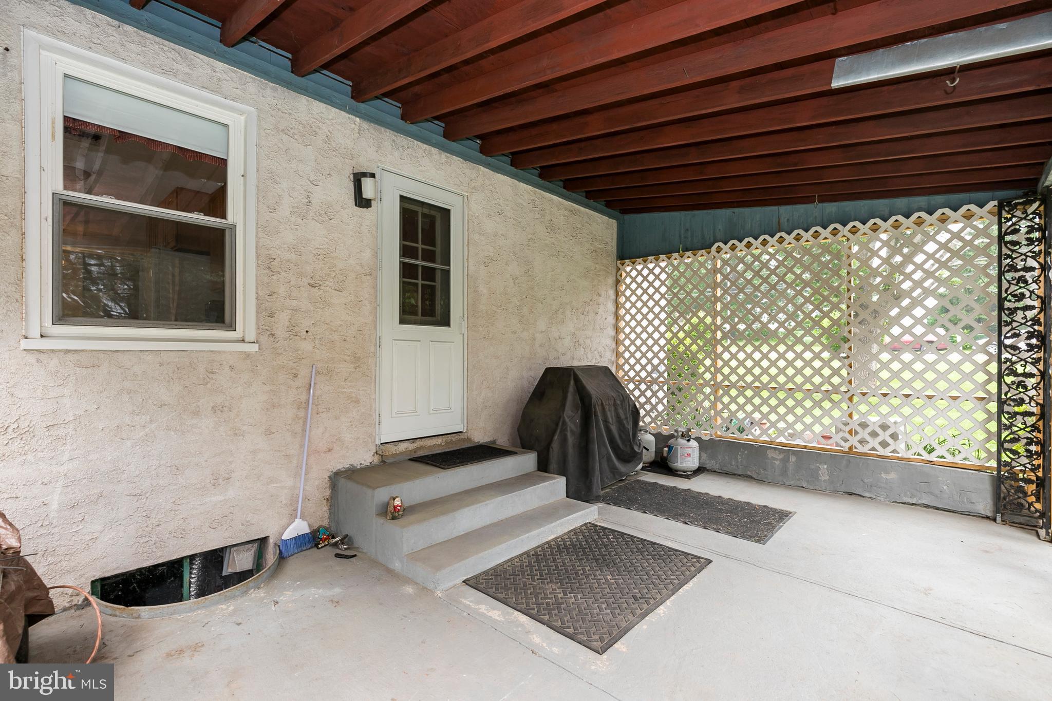 805 South Lewis Road Royersford, PA 19468 - Photo 11 of 26 Screened in porch with entrance to kitchen
