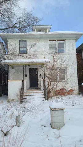 a view of a house with a snow
