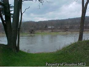 0 River Road Wysox, PA 18854 - Photo 3 of 4 a view of a lake in the backyard