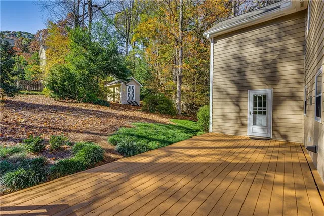 a view of backyard with green space