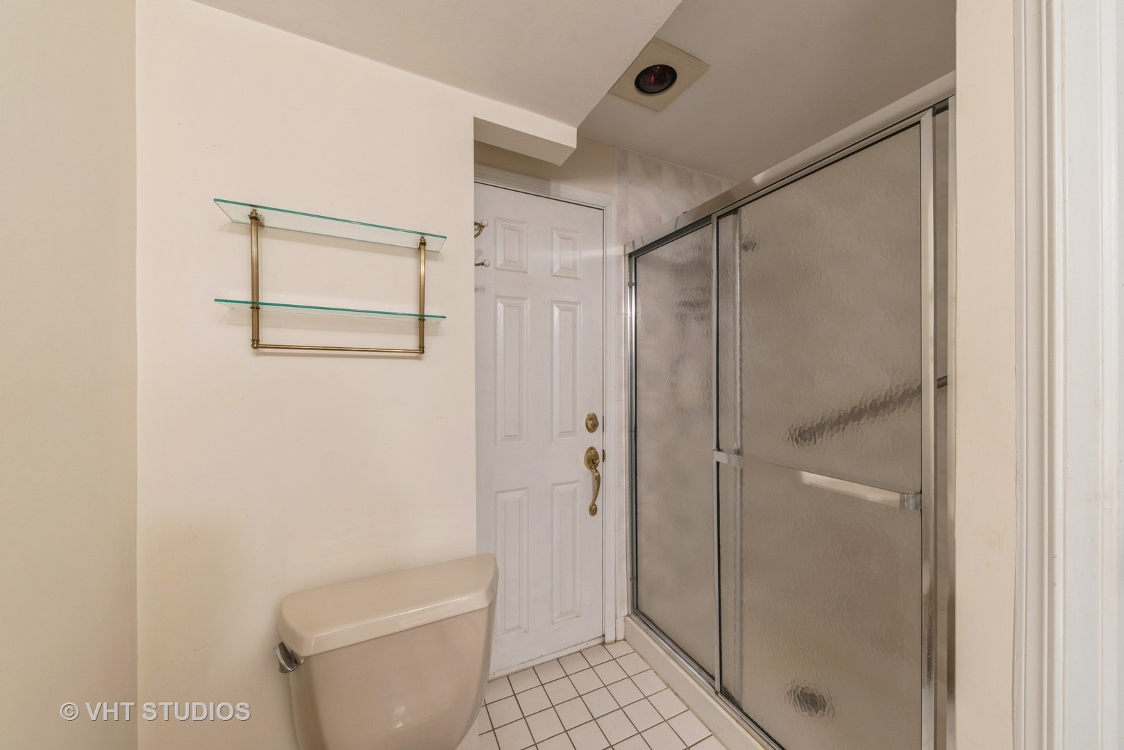 1857 Ashbury Lane, Unit 36 Inverness, IL 60067 - Photo 15 of 20 a bathroom with a shower and a toilet