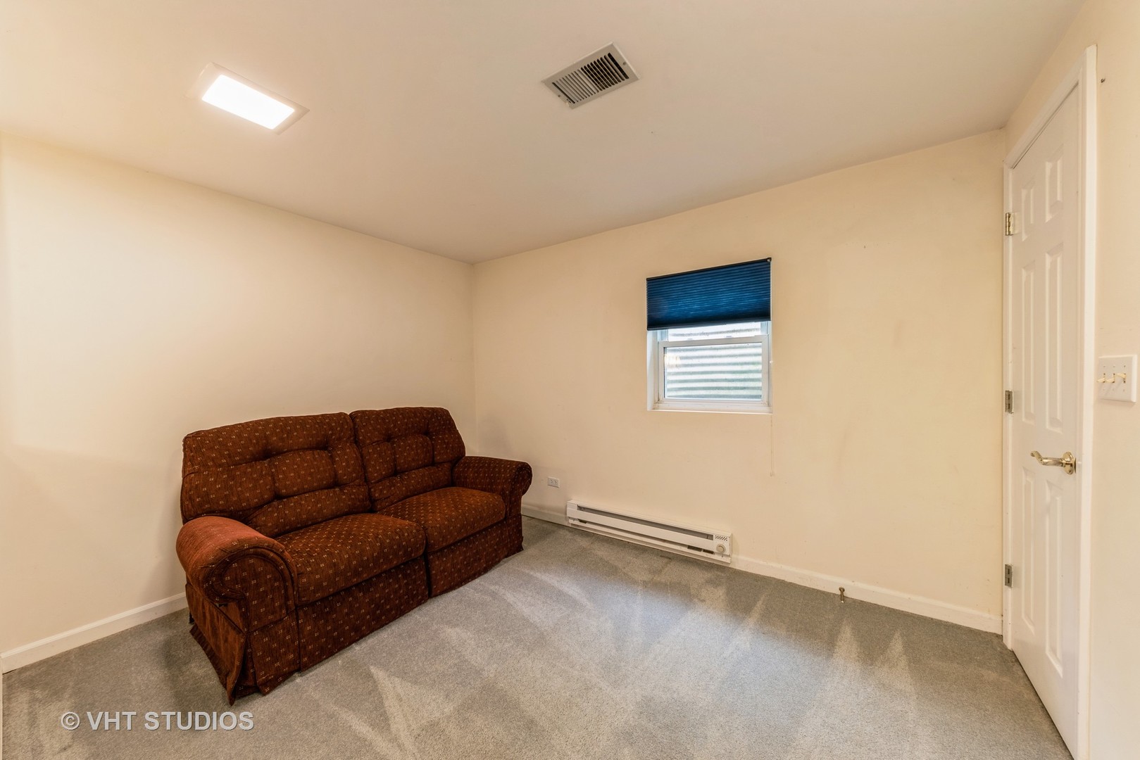 1857 Ashbury Lane, Unit 36 Inverness, IL 60067 - Photo 17 of 20 a living room with furniture and a window