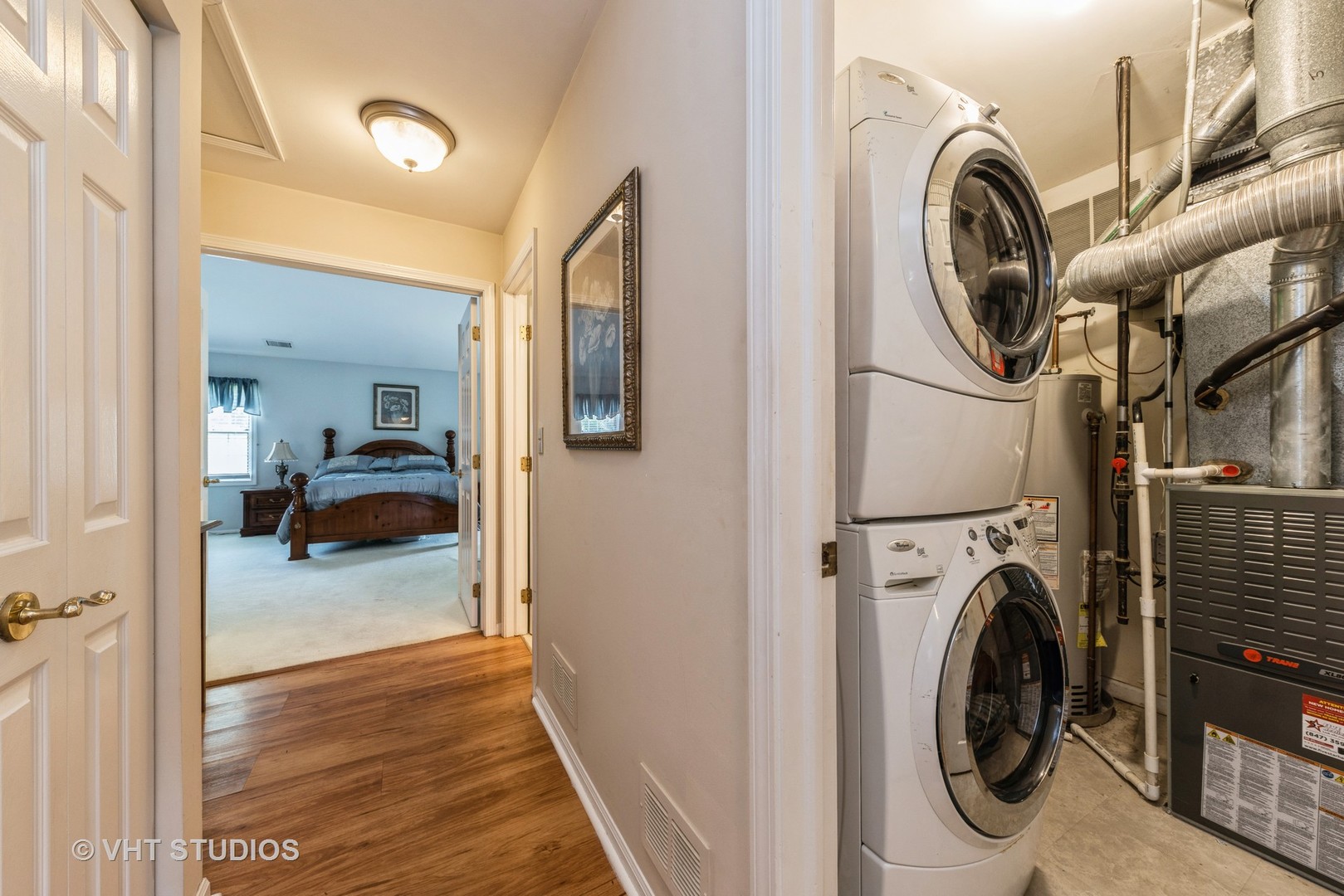 1857 Ashbury Lane, Unit 36 Inverness, IL 60067 - Photo 18 of 20 a view of storage and utility room with washer and dryer