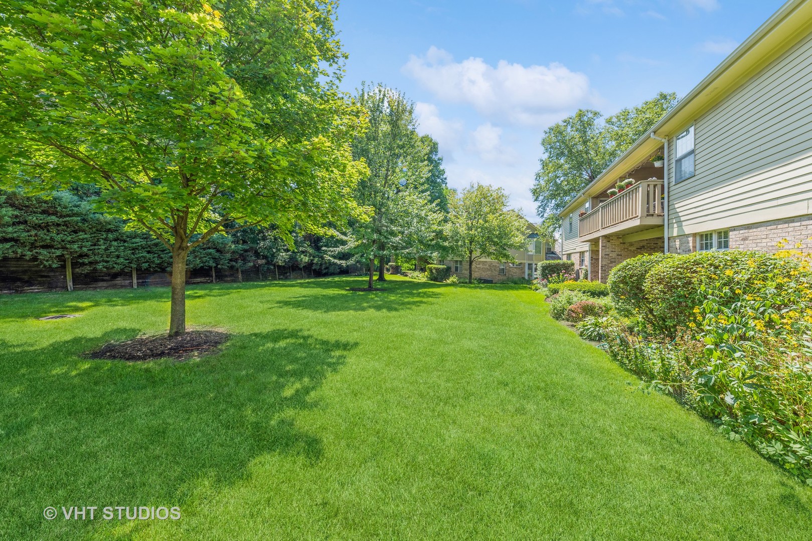 1857 Ashbury Lane, Unit 36 Inverness, IL 60067 - Photo 20 of 20 a view of a house with a backyard