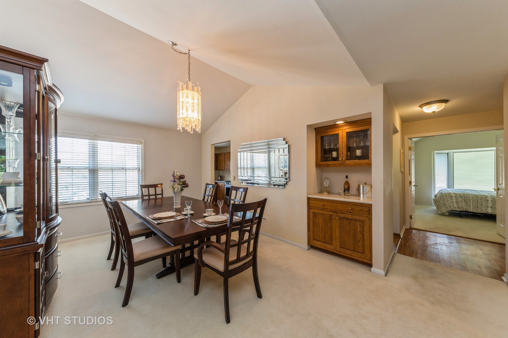 1857 Ashbury Lane, Unit 36 Inverness, IL 60067 - Photo 8 of 20 a view of a dining room with furniture and window