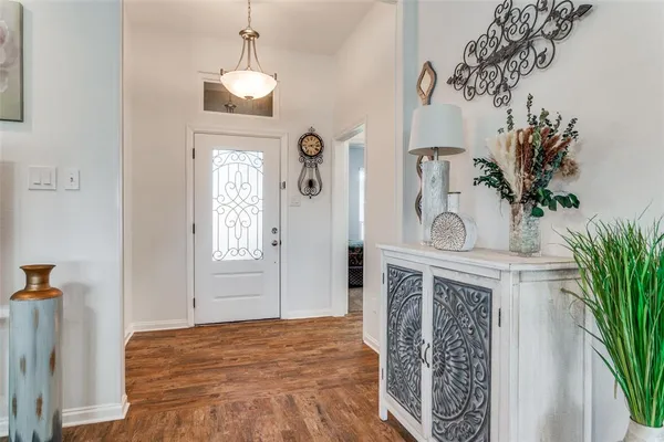 a bedroom with a bed and a fireplace