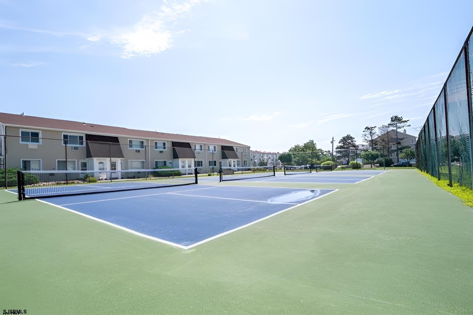 4901 Harbor Beach Boulevard, Unit F2 Brigantine, NJ 08203 - Photo 11 of 46 a view of outdoor space and basketball court