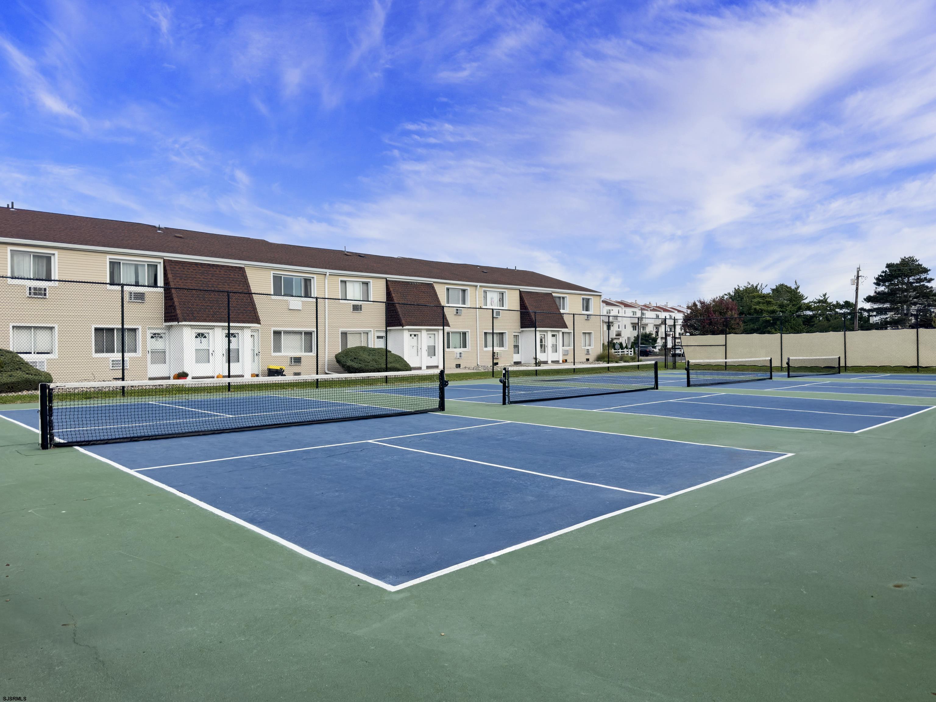 4901 Harbor Beach Boulevard, Unit F2 Brigantine, NJ 08203 - Photo 12 of 46 a view of an outdoor space and basketball court
