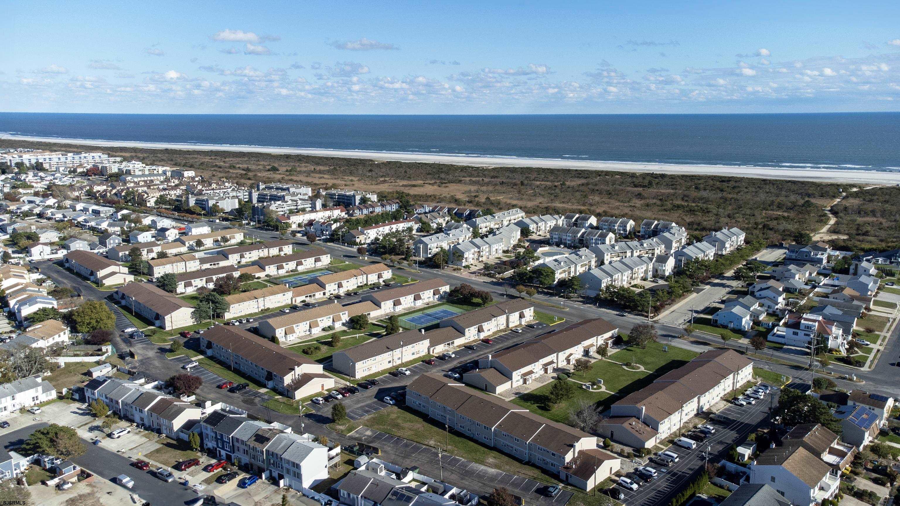 4901 Harbor Beach Boulevard, Unit F2 Brigantine, NJ 08203 - Photo 25 of 46 an aerial view of a city