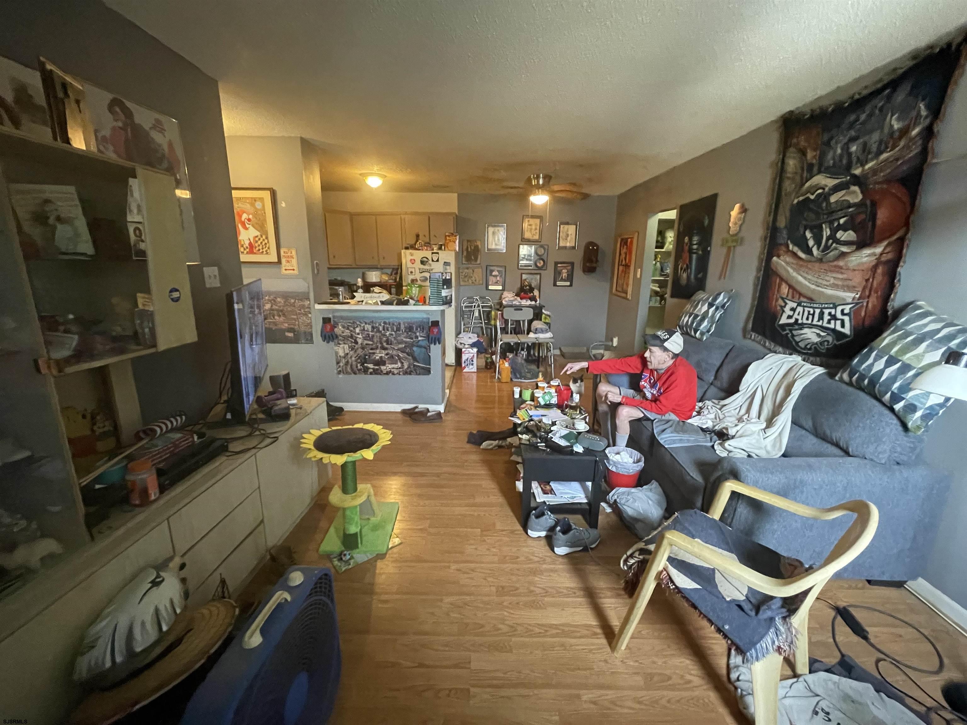 4901 Harbor Beach Boulevard, Unit F2 Brigantine, NJ 08203 - Photo 39 of 46 a living room with furniture