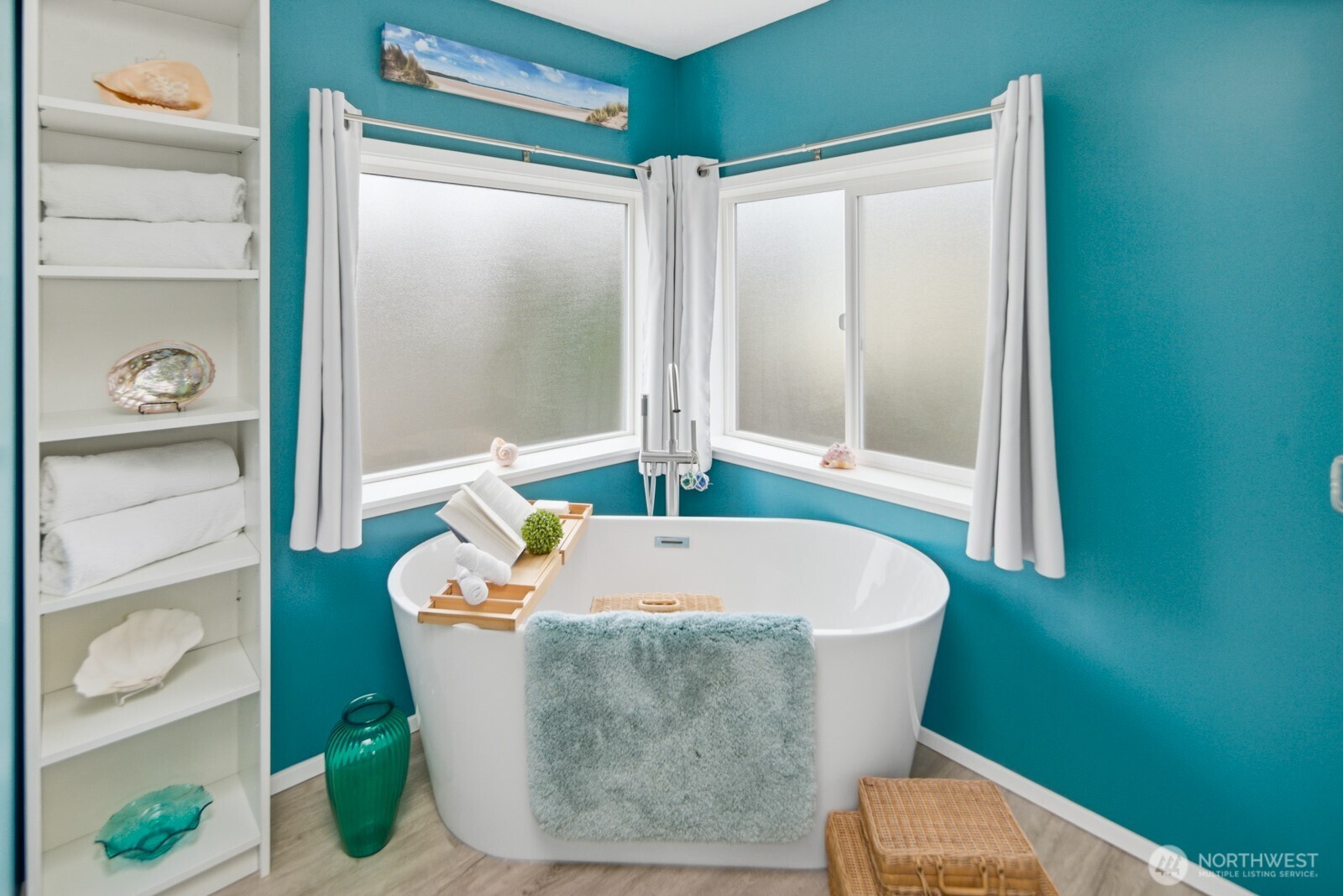 1427 100th Street Southwest, Unit 149 Everett, WA 98204 - Photo 20 of 40 a white bath tub sitting in a bathroom